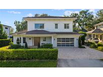 Stunning two-story home with modern design and landscaping at 830 Oakdale St, Windermere, FL 34786