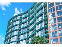 Modern high-rise building with teal accents at 322 E Central Blvd # 1807, Orlando, FL 32801