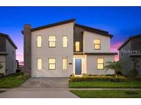 Stunning two-story home with modern design and landscaping at 4535 Narrative Ln, Kissimmee, FL 34746