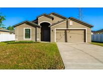 Newly built home with two-car garage at 207 Goldenrod Ln, Kissimmee, FL 34759