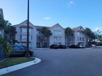 Building exterior showcasing a multi-unit apartment building at 3100 Parkway Blvd # 748, Kissimmee, FL 34747