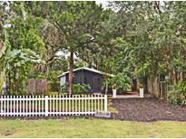 Quaint house with white picket fence and screened porch at 2809 S Brown Ave, Orlando, FL 32806