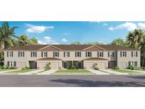 Three-story townhouses with attached garages and landscaping at 3349 Private Oak Dr, Apopka, FL 32703