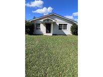 House exterior with white siding and a large yard at 1685 S Wallace Ave, Bartow, FL 33830