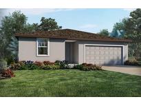 One-story home with gray siding, brown roof, and attached garage at 4953 Kaia Ave, Winter Haven, FL 33884