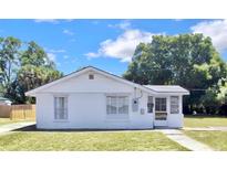 Quaint white house with a well-maintained lawn at 841 Vernon St, Daytona Beach, FL 32114