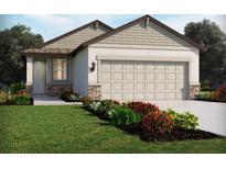 One-story home with a two-car garage and landscaped front yard at 2758 Virginia Pine Dr, Bartow, FL 33830