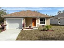 Newly constructed home with a one-car garage and a well-maintained lawn at 6921 Central Ave, Mulberry, FL 33860