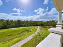 View from balcony overlooking the golf course at 7612 Cabana Ct # 303, Reunion, FL 34747