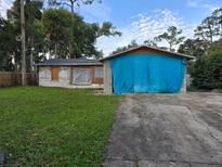 Fixer-upper home with a large yard at 384 Magnolia Pl, Debary, FL 32713