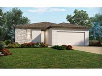 One-story home with stone accents, landscaped yard, and attached garage at 5170 Minneola Ln, Saint Cloud, FL 34772