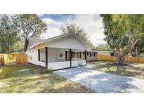Charming one-story home with a covered porch and well-maintained yard at 280 Westwood Ave, Winter Haven, FL 33880