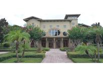Elegant community center with landscaped grounds at 1341 Arbor Vista Loop # 213, Lake Mary, FL 32746