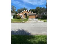 Charming one-story house with attached garage at 1844 Oxton Ct, Ocoee, FL 34761