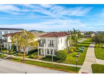 Stunning aerial view of the property and neighborhood at 7824 Whitemarsh Way, Reunion, FL 34747