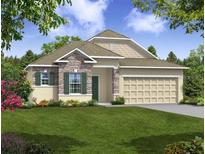 Two-story house with stone and shingle accents at 108 Burlington Pl, Poinciana, FL 34758