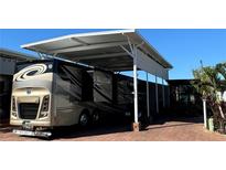 Spacious RV garage with covered parking for large vehicles at 2025 St George Dr, Davenport, FL 33837