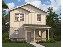 Two-story house with light beige siding, stone accents, and a walkway at 5538 Stockade Blvd, Saint Cloud, FL 34771