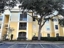 Three-story condo building with balconies and ample parking at 1175 Lake Shadow Cir # 4103, Maitland, FL 32751