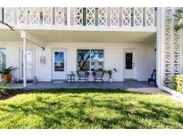 Ground level condo with patio furniture and grassy lawn at 1140 S Orlando Ave # 3, Maitland, FL 32751