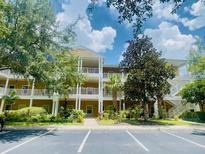 Inviting 3-story building with ample parking at 608 Rum Run # 608, Davenport, FL 33897