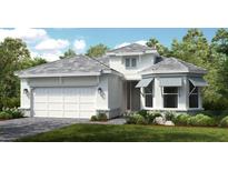 White two-story house with gray roof, shutters, and landscaping at 863 Arbor Green Trl, St Cloud, FL 34771