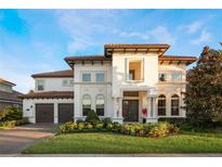 Stunning two-story home with a tile roof and landscaped front yard at 3867 Grassland Loop, Lake Mary, FL 32746