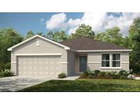 Single-story house with attached garage and landscaped lawn at 5021 Bougainvillea Ct, Lake Hamilton, FL 33851