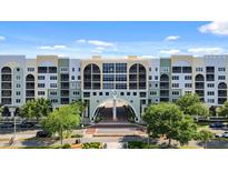 Condo building with waterfront views and a grand entrance at 225 W Seminole Blvd # 512, Sanford, FL 32771