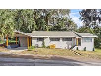 Charming renovated home with carport and landscaped yard at 507 Orange Ave, Ocoee, FL 34761