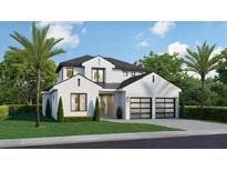 Two-story home with modern design, two-car garage, and palm trees at 2260 Mulbry Dr, Winter Park, FL 32789