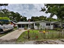 Cute single story home with fenced yard, boat, and mature trees at 431 Perdita Ave, Edgewater, FL 32132