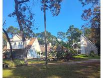 Two-story home with stone accents and a large yard at 660 Ferne Dr, Longwood, FL 32779