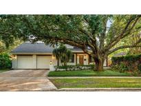 Charming ranch home with mature landscaping and a two-car garage at 2330 Westminster Ct, Winter Park, FL 32789
