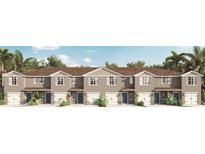 New townhome community with 5-unit building, 2-car garages, and neutral color palette at 2921 Hudson Hammock Way, St Cloud, FL 34773