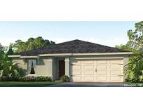 Single-story house with a two-car garage and neutral-color exterior at 418 Caraway Dr, Kissimmee, FL 34759
