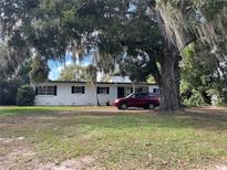 Ranch style home with carport and spacious yard at 116 Main St, Windermere, FL 34786