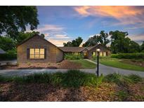 Beautiful brick home with landscaping and a paved driveway at 2811 Se 14Th St, Ocala, FL 34471