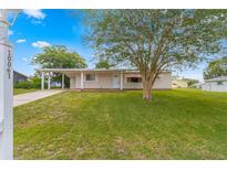 Single story house with carport and large yard at 10061 Sw 88Th Ter, Ocala, FL 34481