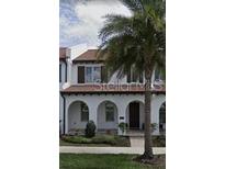 Beautiful two-story home with arched entryway at 8943 Lakeshore Pointe Drive, Winter Garden, FL 34787