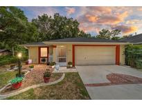 Cute single-story house with a landscaped front yard at 1020 Ne 30Th Ave # 131, Ocala, FL 34470