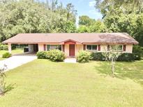 Ranch style home with carport and large yard at 1779 Ne 12Th St, Ocala, FL 34470