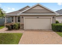 Charming one-story house with a two-car garage and landscaped yard at 3966 Nw 46Th Ter, Ocala, FL 34482