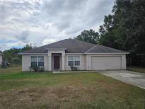 Charming one-story house with a two-car garage at 21 Dogwood Pl, Ocala, FL 34472