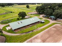 Farm with barns, riding arenas and paddocks at 8010 Nw 125Th St, Ocala, FL 34482