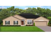 One-story home with beige exterior, dark roof, and two-car garage at 4063 Sw 112Th Ln, Ocala, FL 34476