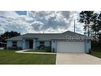 Charming one-story house with a two-car garage at 6272 Sw 155 Street Rd, Ocala, FL 34473