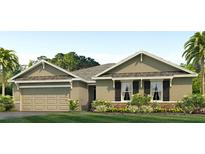 Exterior of a craftsman style home with a two-car garage at 305 Hickory Course Trl, Ocala, FL 34472