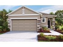 Modern single-story home with stone accents and two-car garage at 4086 Nw 44Th Cir, Ocala, FL 34482