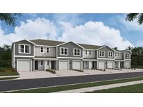 New townhome development showcasing multiple units with garages at 6612 Sw 81St Loop, Ocala, FL 34476